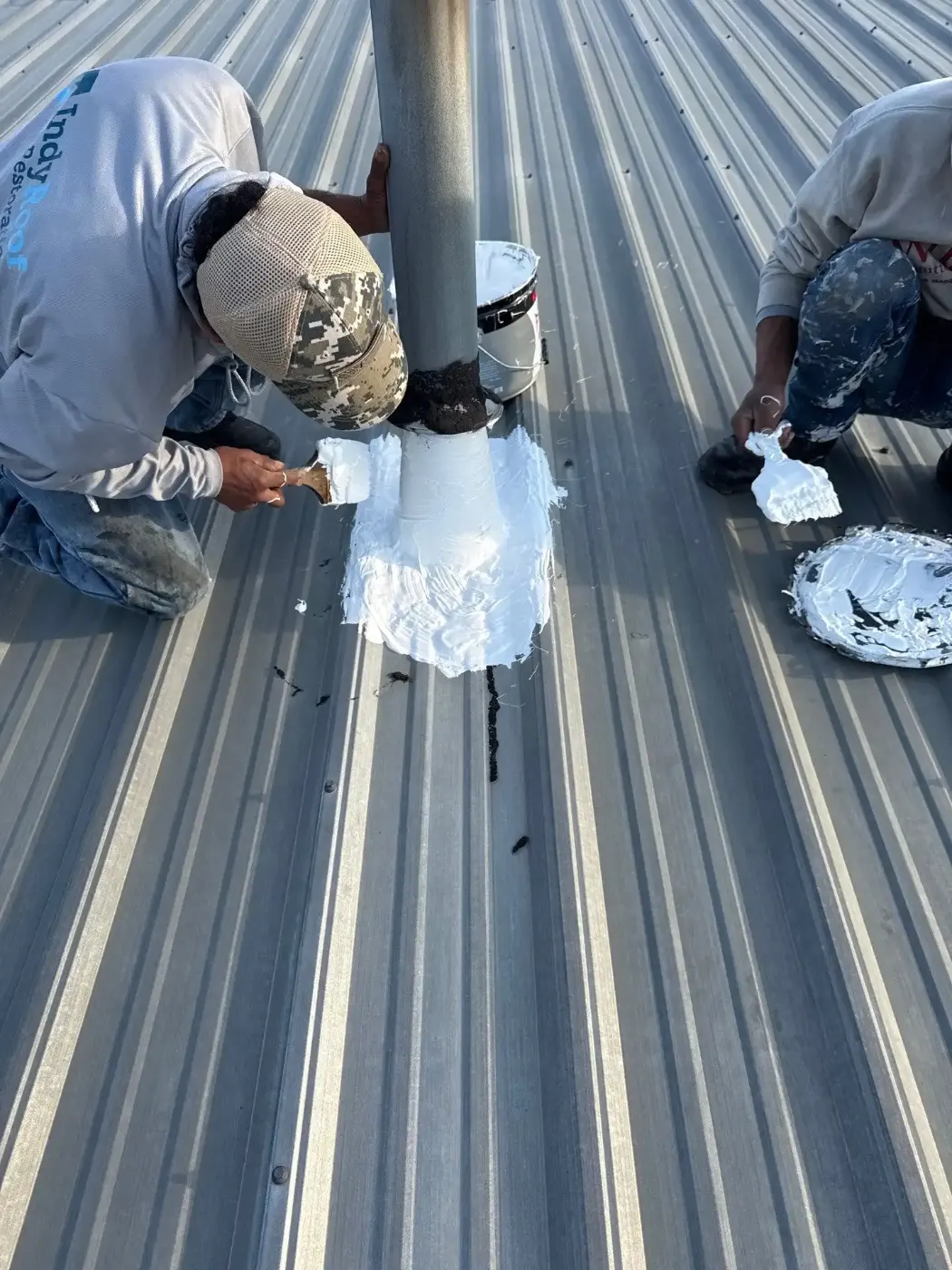 Tarping and dry-in on a Cloverdale commercial roof